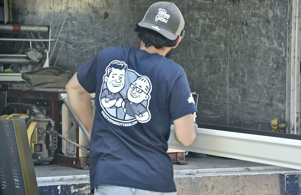 Carrying a freshly formed seamless run to the roofline