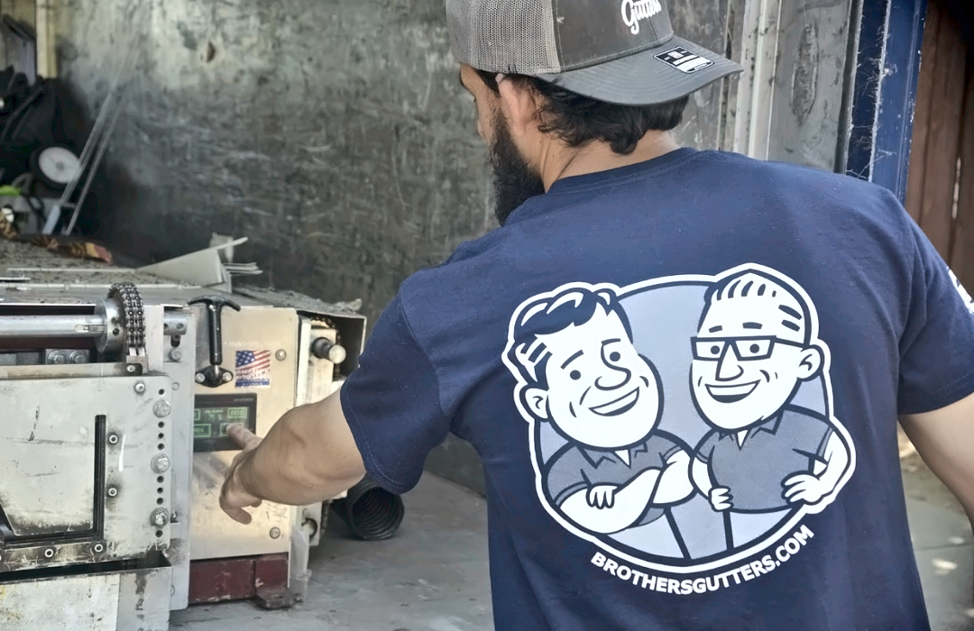 Running seamless gutter through the machine at the truck
