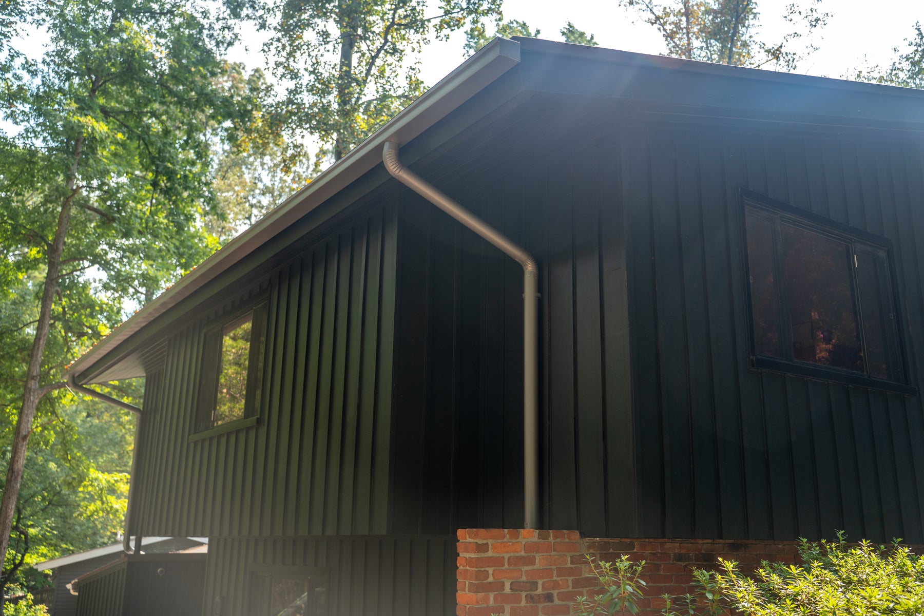 Dark box gutters on a modern home