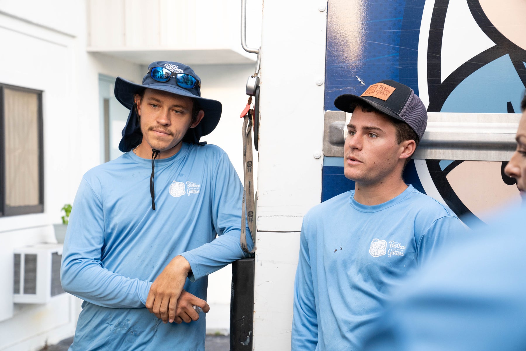 Brothers Gutters crew members at the shop